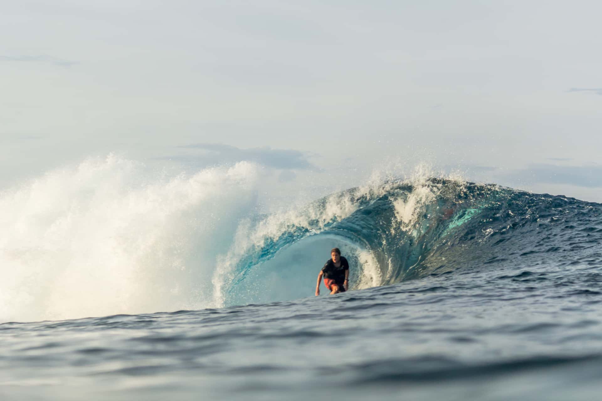Surfer getting barelled at Tuason in Siargao, Philippines.