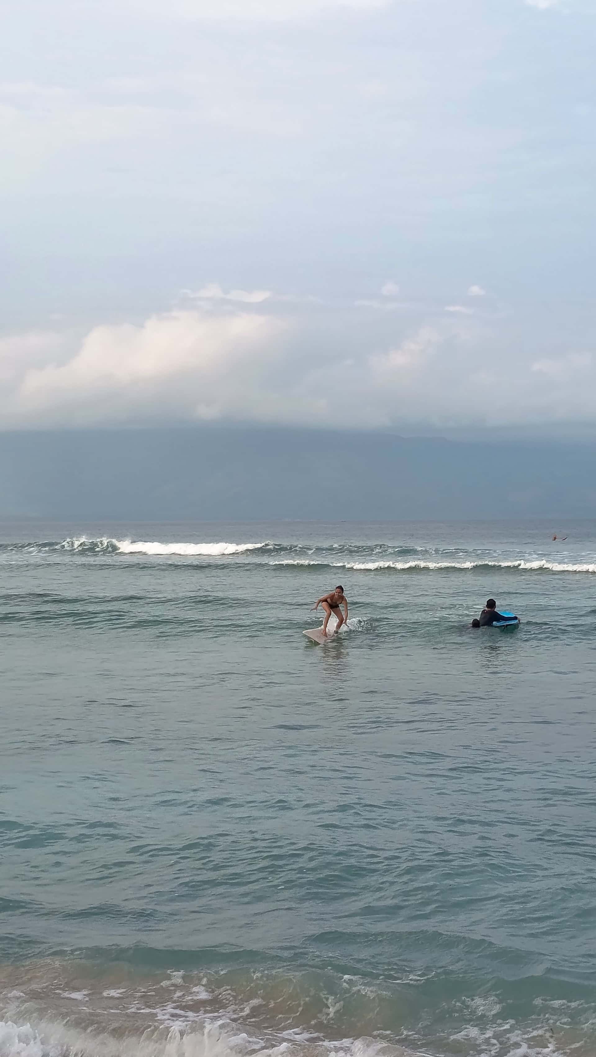 Surfing at Dahican Beach, Mati