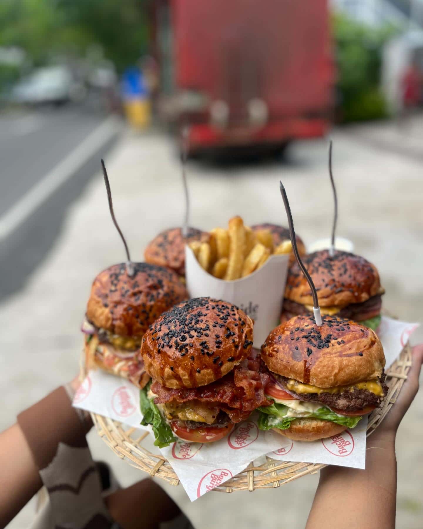 Sliders with fries served on a tray