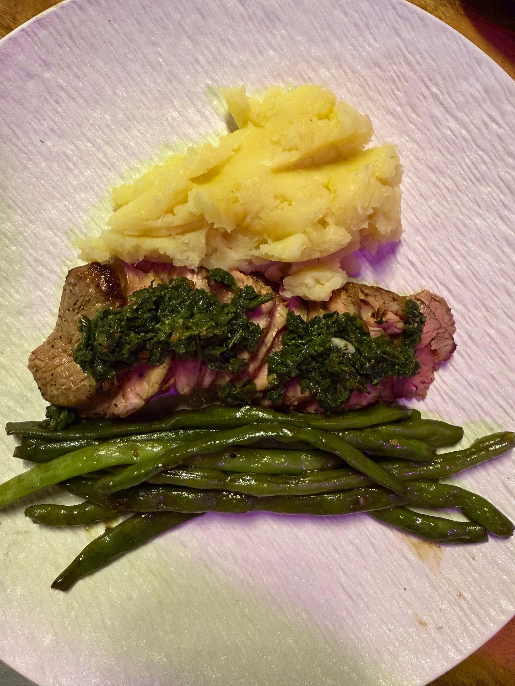 Sliced steak with chimichurri and green beans at Cockatoo Restaurant, Tambisan, San Juan, Siquijor
