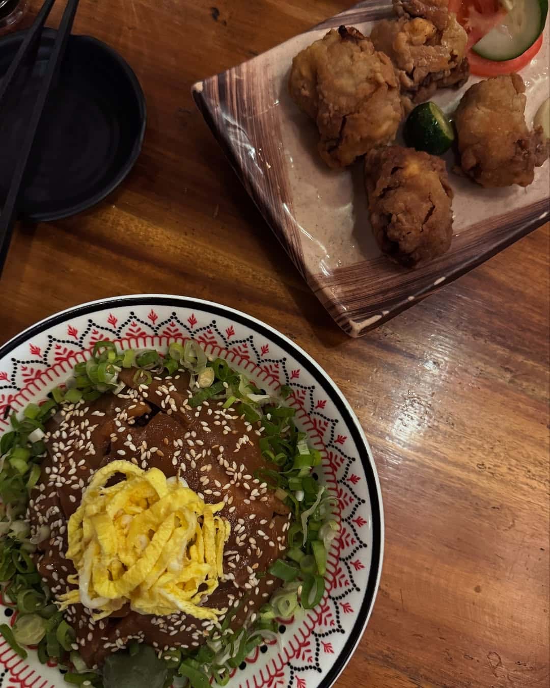 Rice bowl topped with sesame and greens