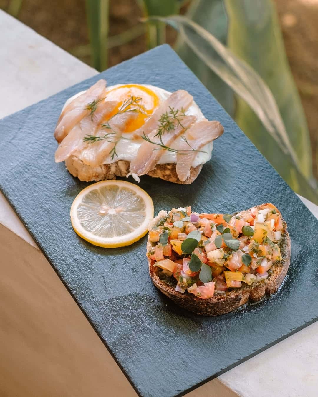 Smoked fish toast with lemon and salsa