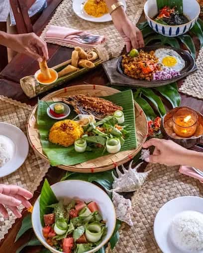 Filipino platter served on banana leaf