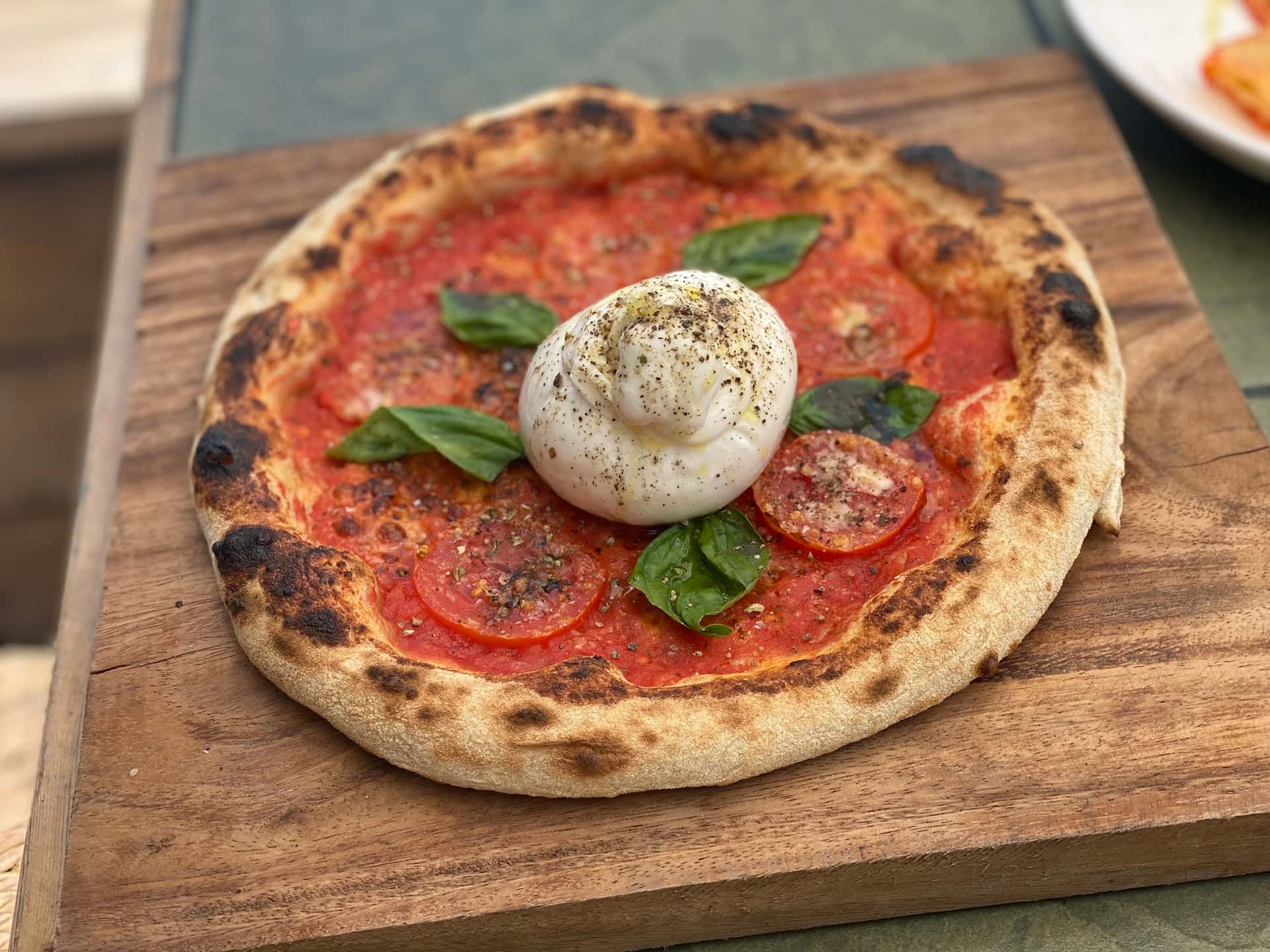 Wood-fired pizza with burrata at Kermit La Union, San Juan, La Union