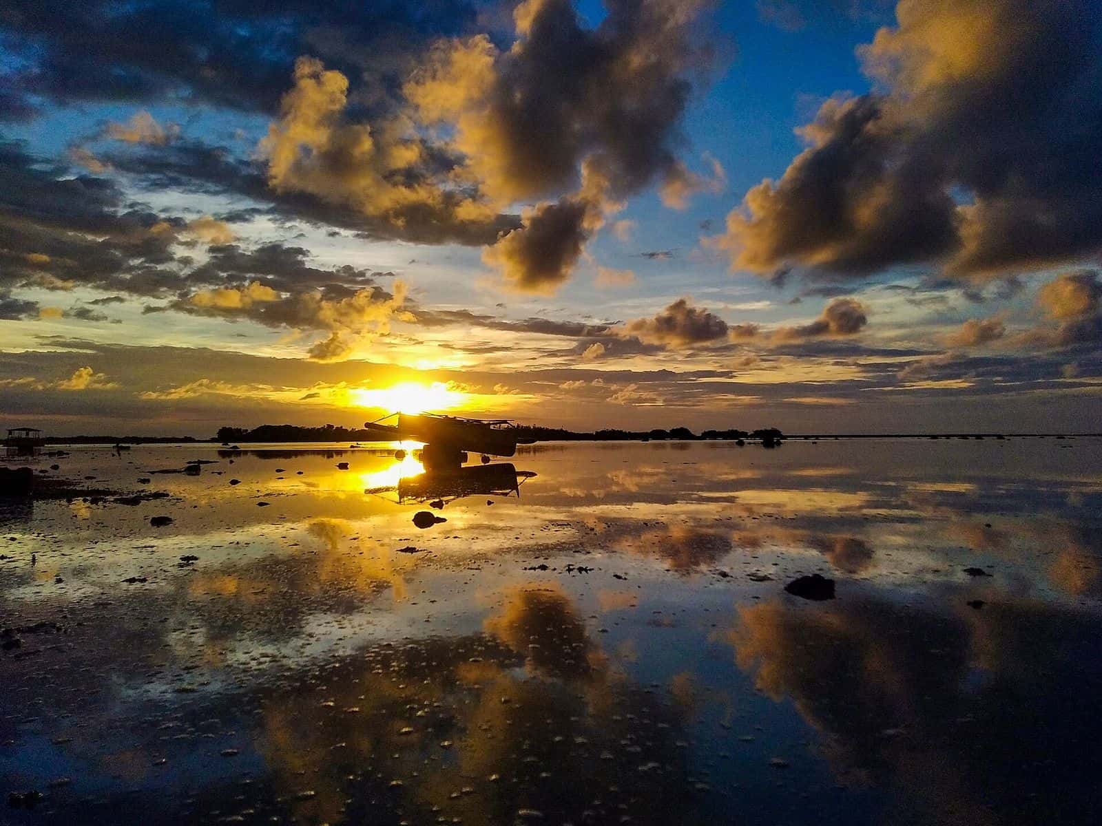 Sunset over the tidal flats at Immuki Island, Balaoan, La Union