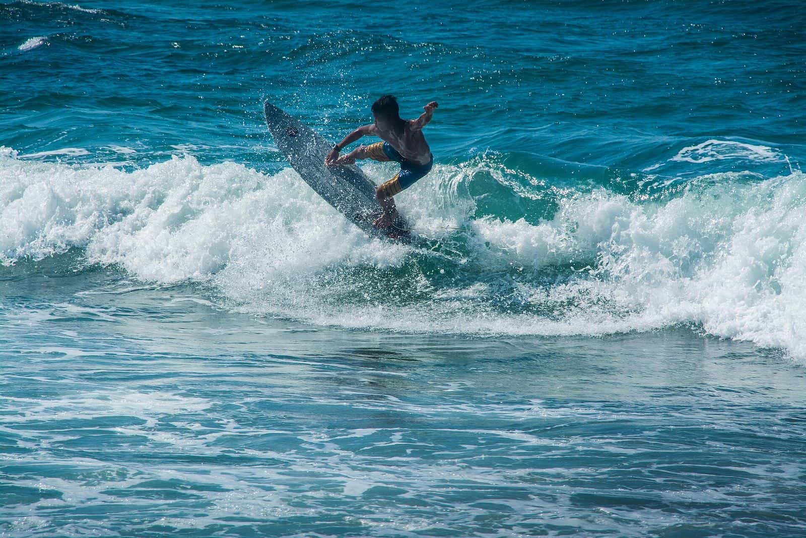 Surfer riding a wave in San Juan, La Union
