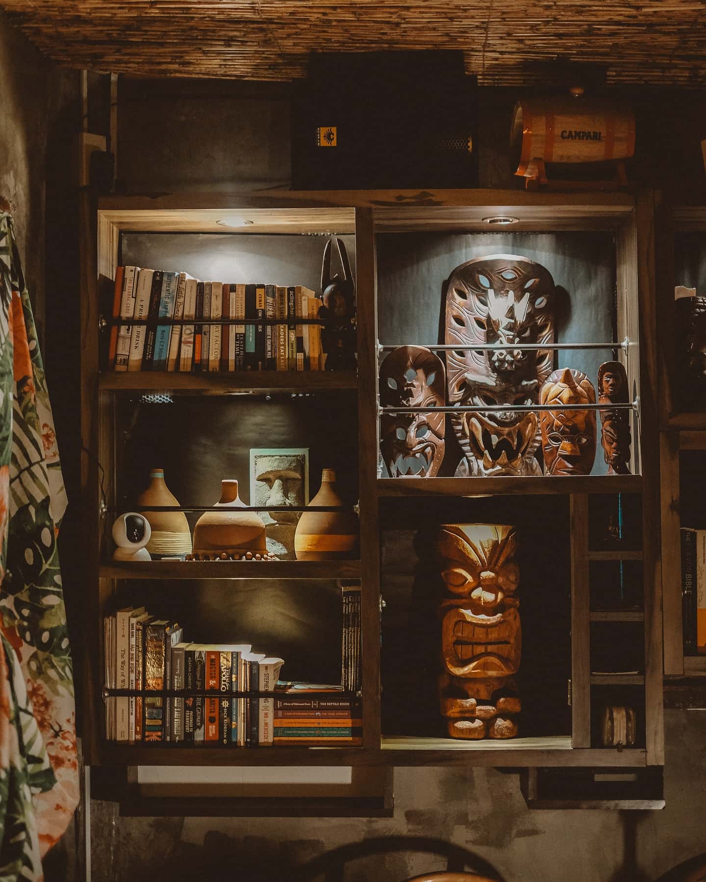 Wooden shelves of books and ornaments