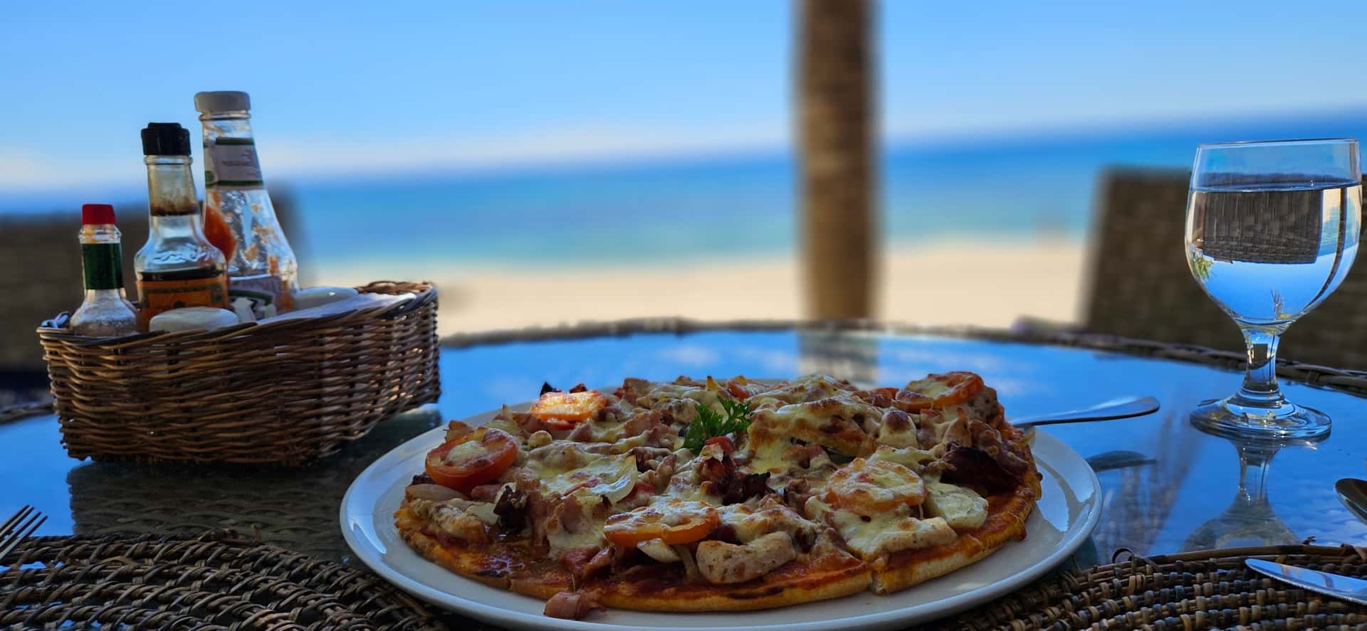Pizza with a beach view at Salamandas Restaurant, Coco Grove, San Juan, Siquijor