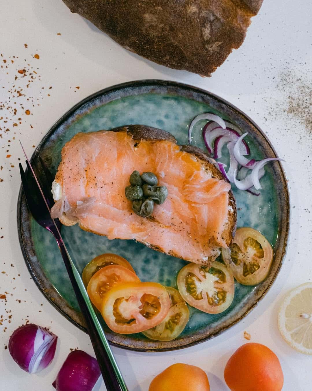 Salmon poke bowl with red onion and jalapeno