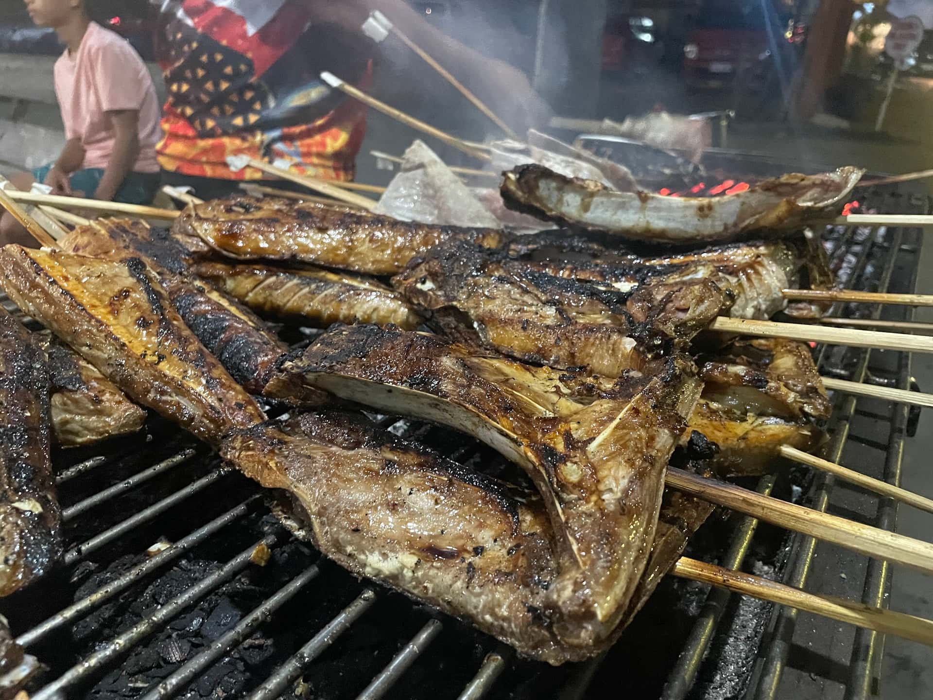 Tuna grilling over charcoal at Tunahan Ni Jendon Sa Baywalk, Baywalk, Mati City