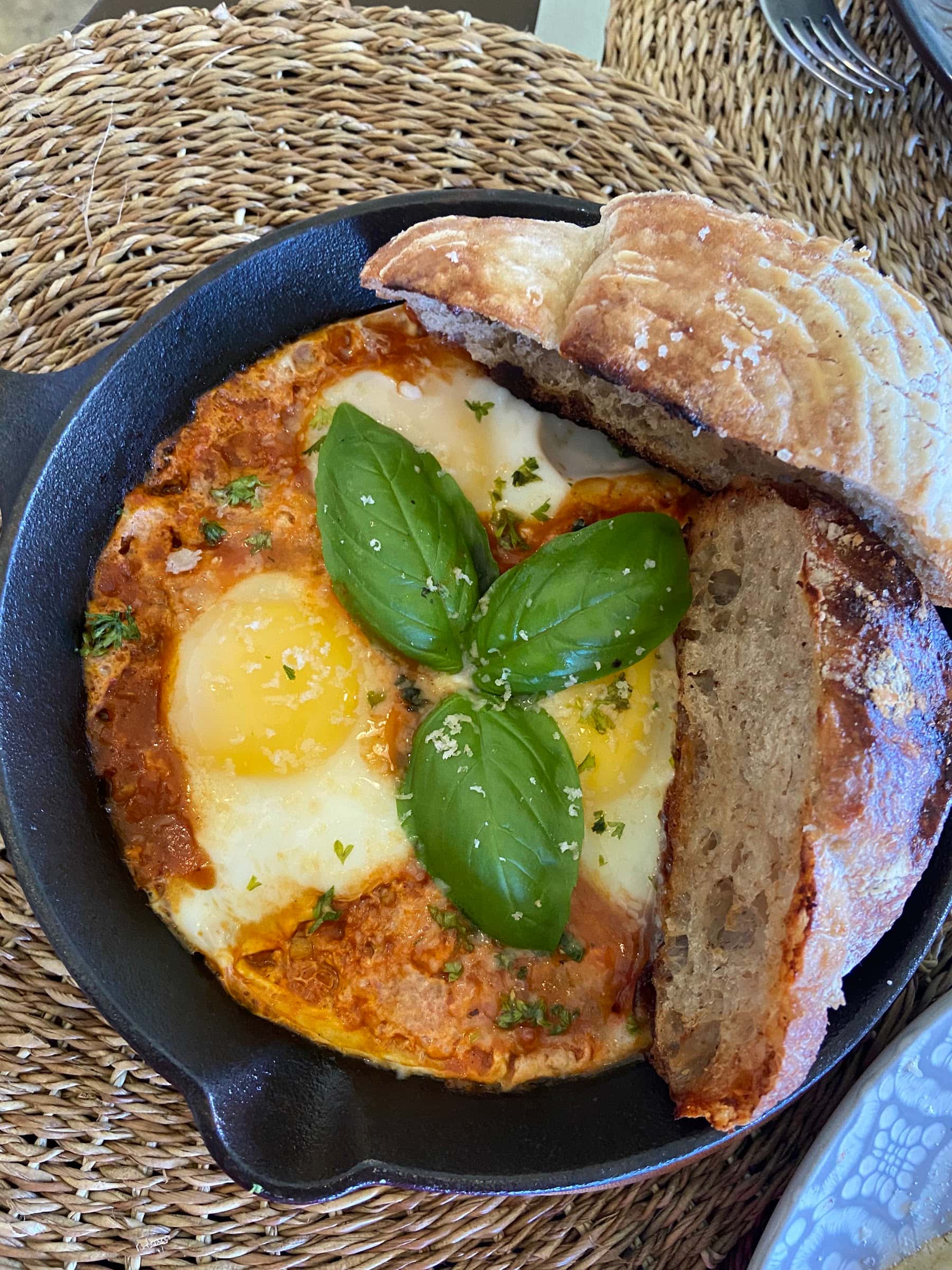 Shakshuka with basil and toast at Wax Surf, Mati City