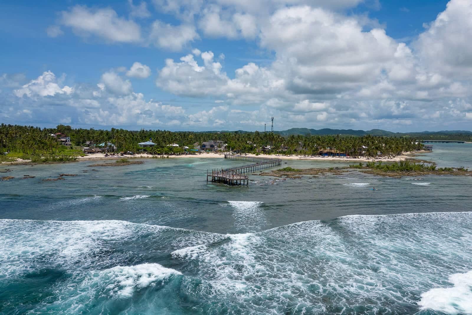 Cloud 9 boardwalk and the Catangnan shoreline where the surf resorts sit, Siargao