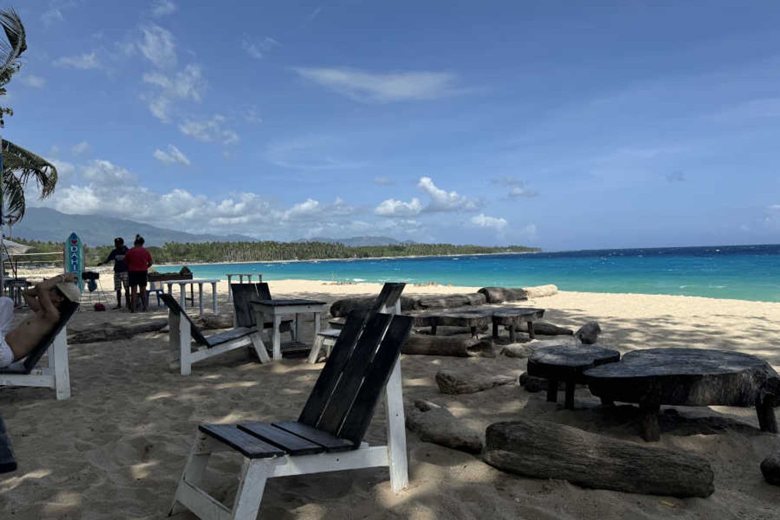 Beach chairs facing the sea at Dahican