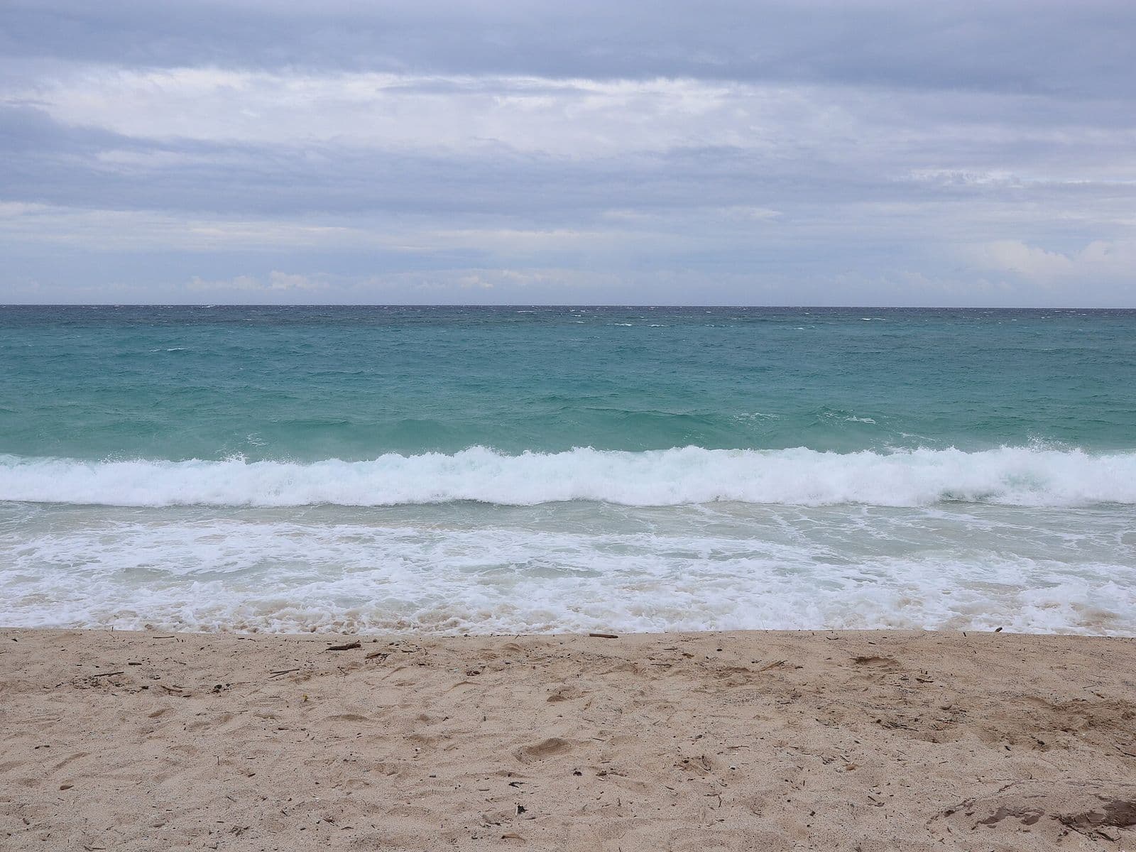 Waves breaking on Dahican Beach
