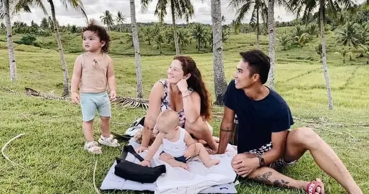 Philmar Alipayo and family picnicking among the palms in Siargao