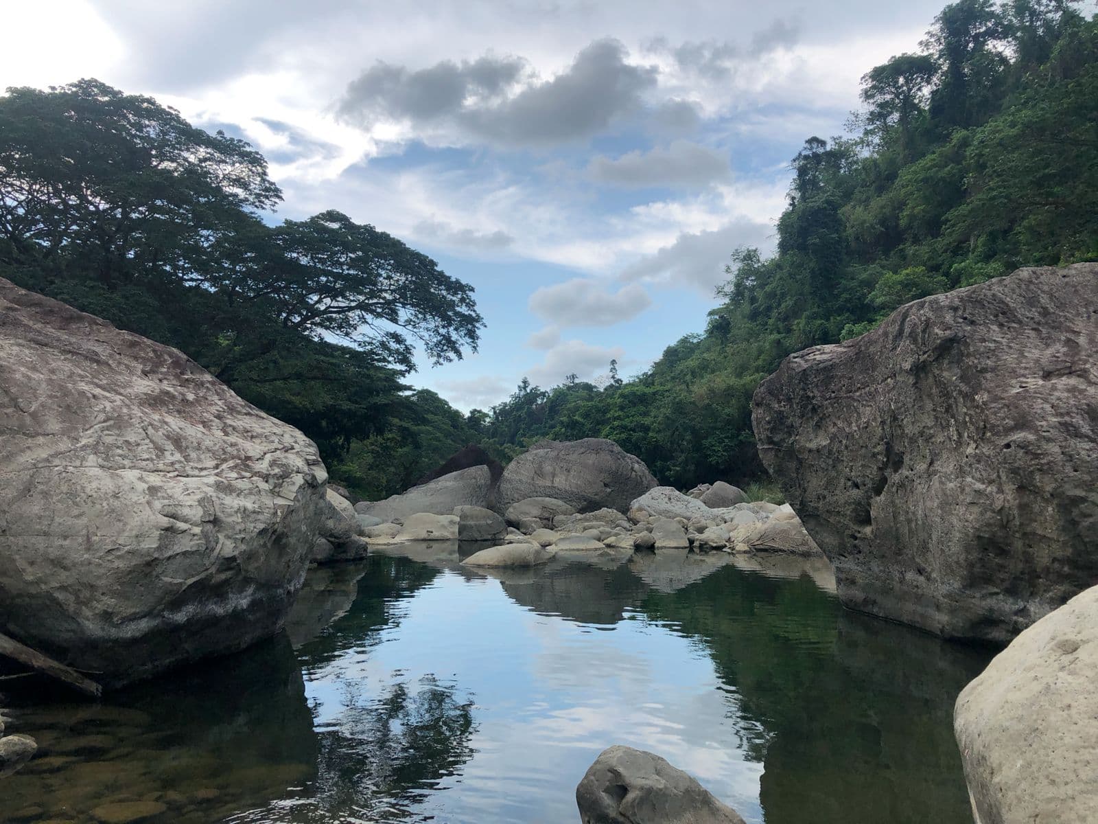 Boulders along the Baroro River on the trail to Tangadan Falls, La Union