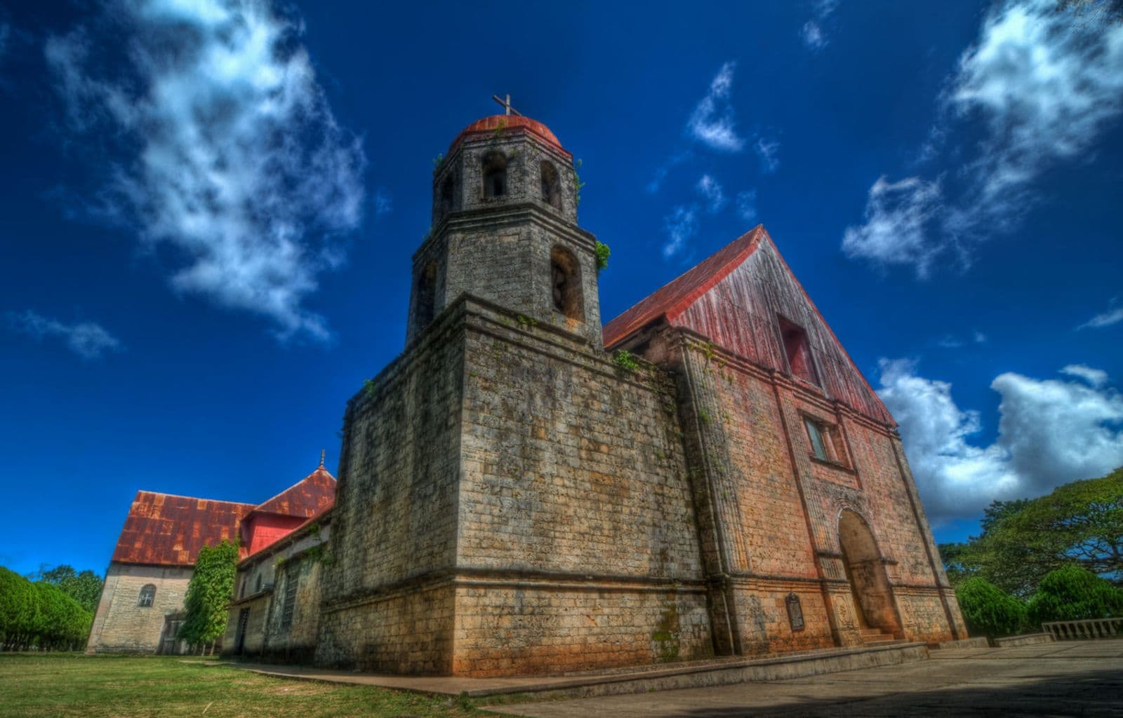 Coral-stone bell tower and facade of Lazi Church, Siquijor