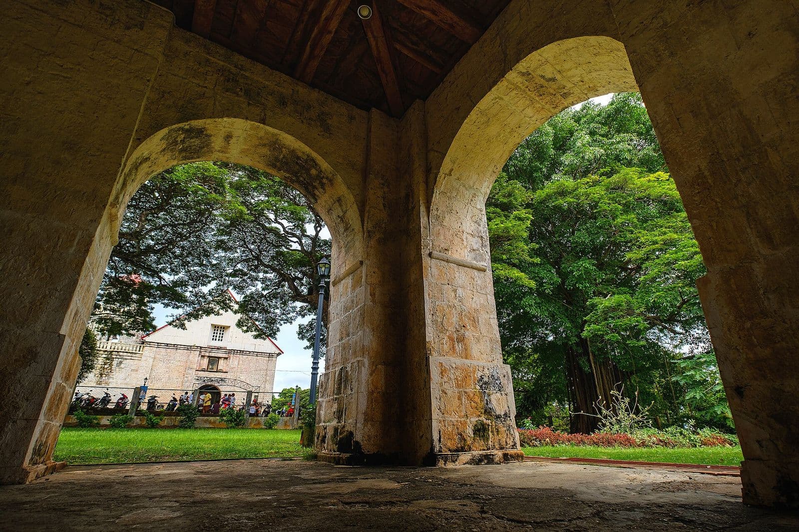 Looking through a stone arch towards the Lazi convent