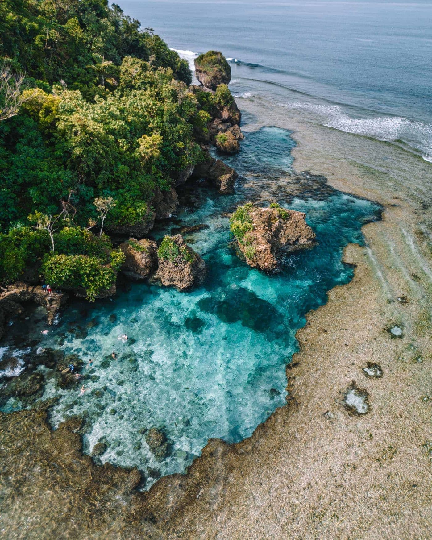 Magpupungko Rock Pools submerged at high tide, Pilar, Siargao
