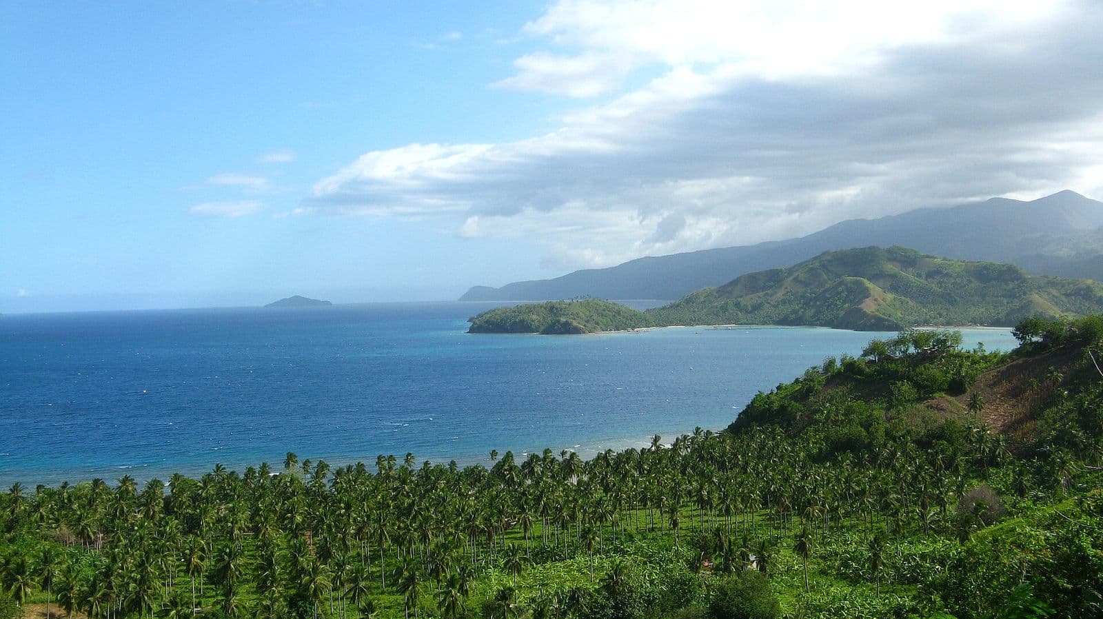Pujada Bay coastline from Badas