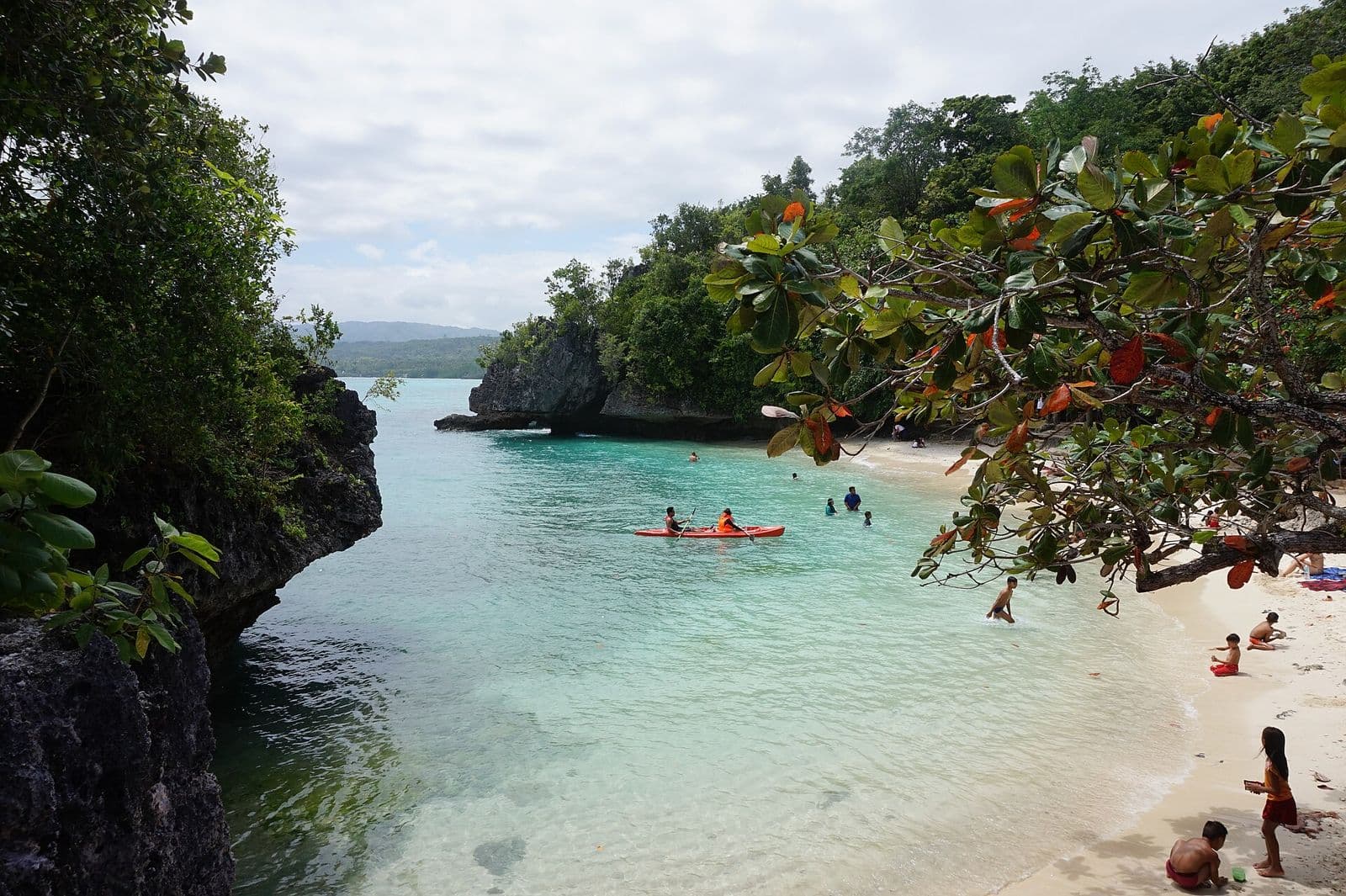 Kayakers in the cove at Salagdoong Beach