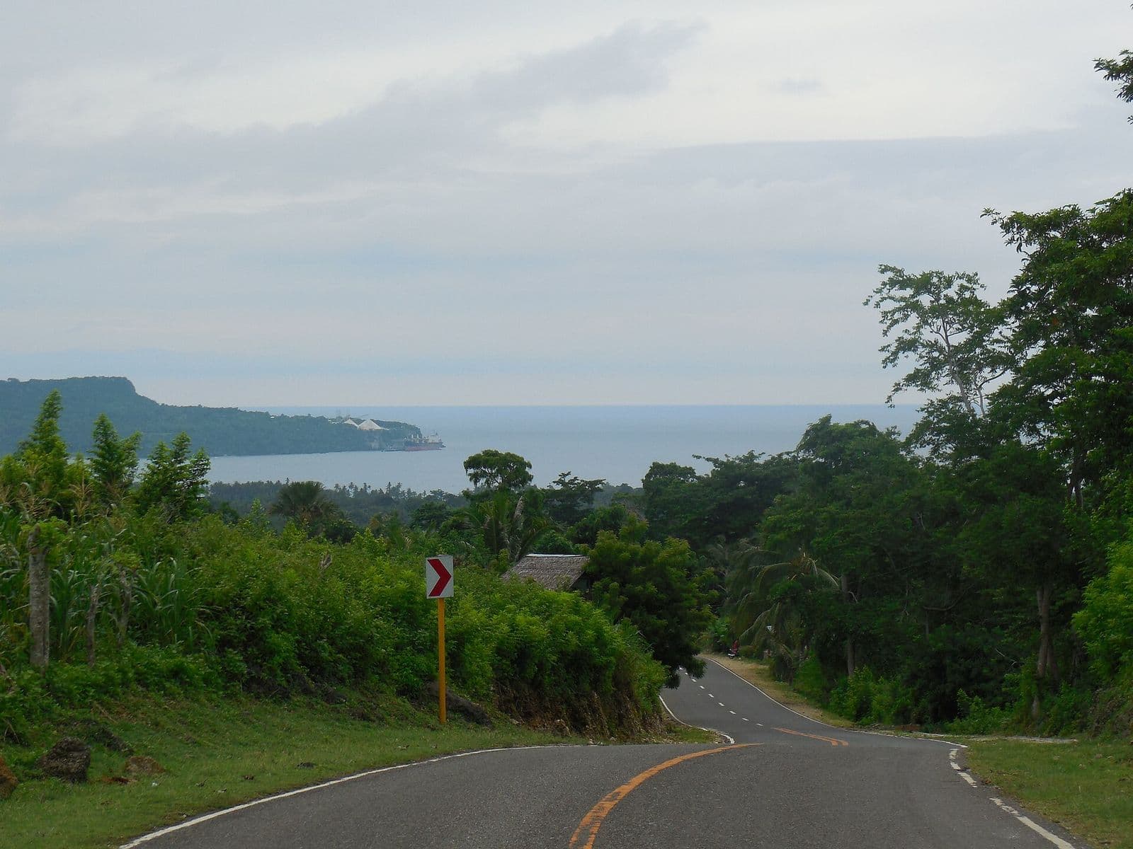 The coast road in Lazi with a view of Lazi Bay